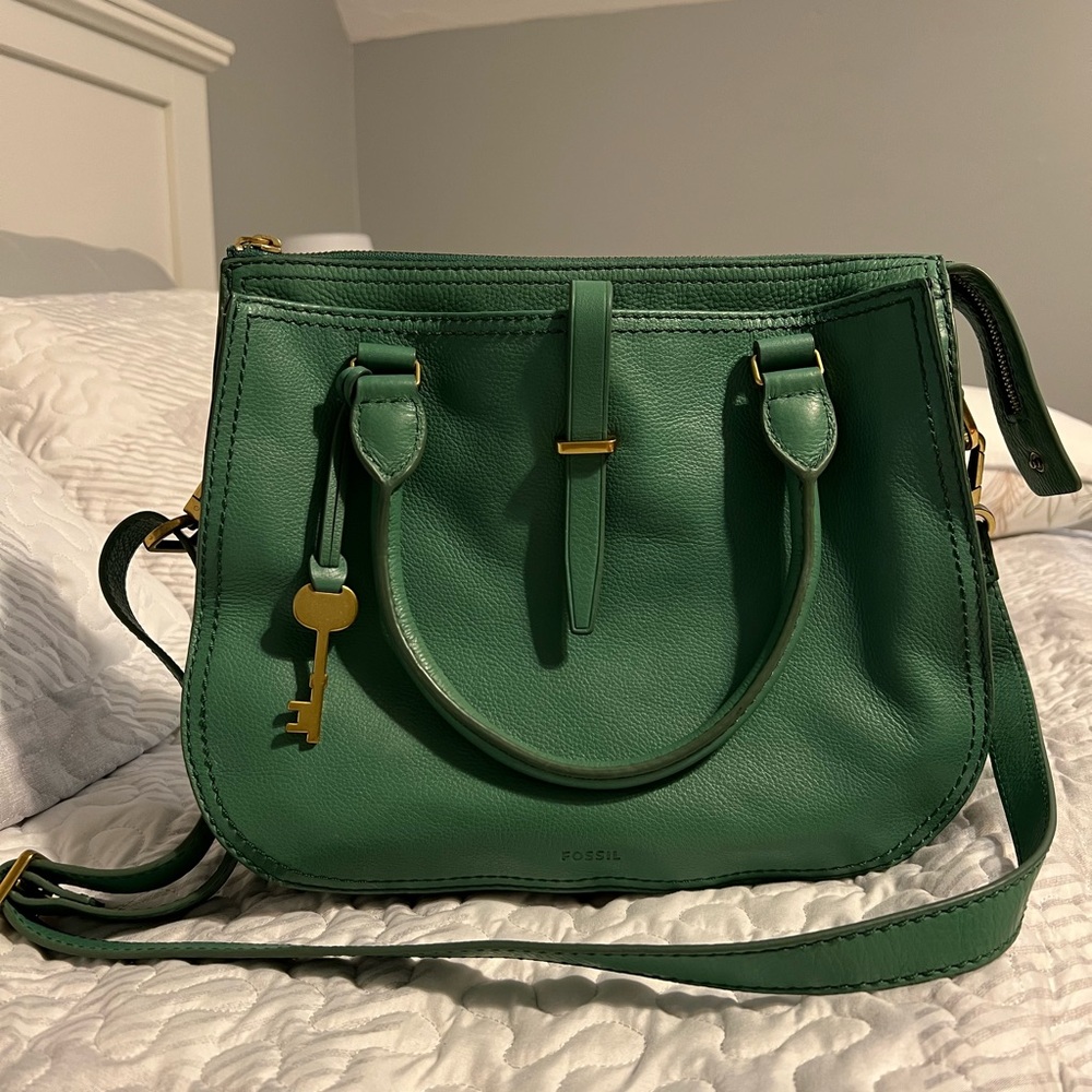 Large green fossil purse. Top handles and strap for crossbody.
